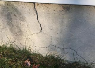 Crumbling concrete basement wall